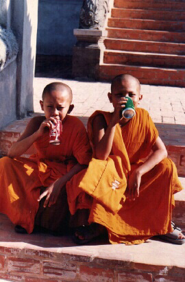 Young Monks Getting A Taste Of The West